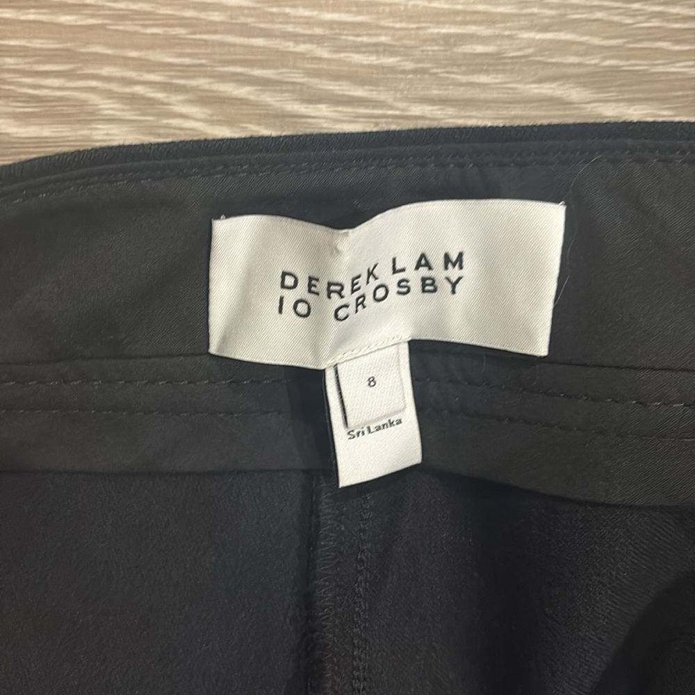 Women's Black Flared Pants with Gold Button Accents - Picture 2 of 4